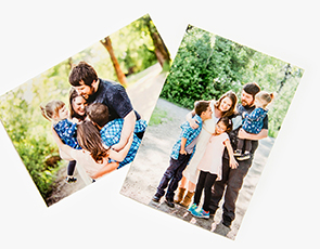 Family of four posing for pictures on a Custom Professional Photo Prints